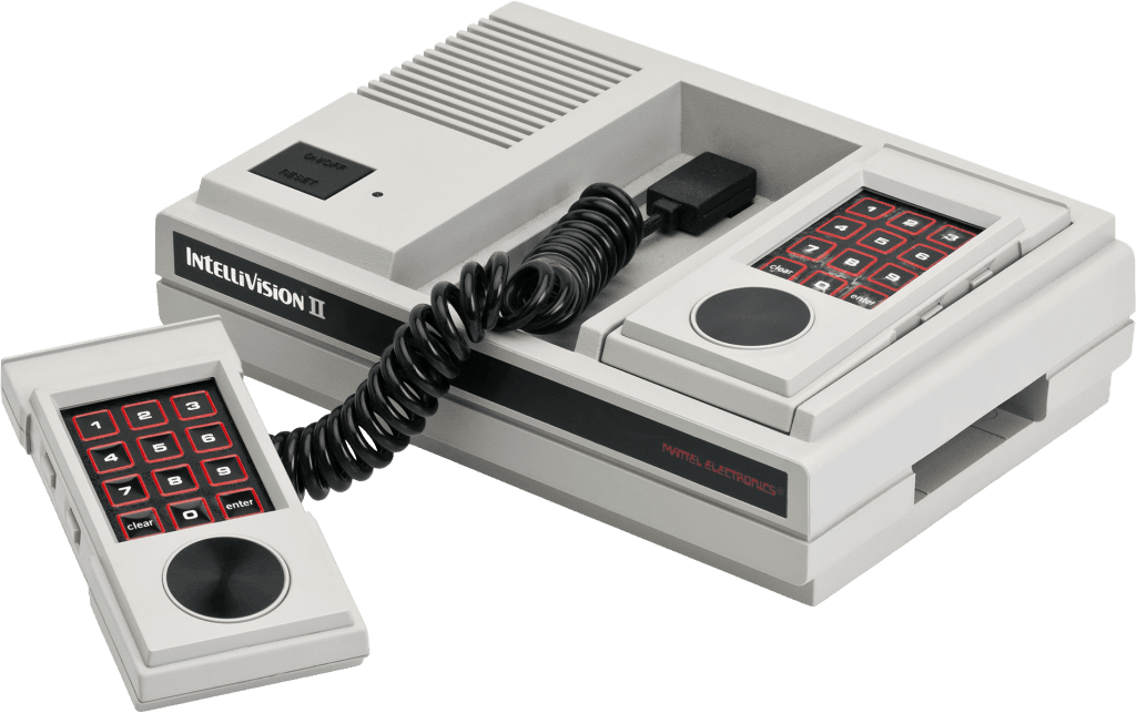 Mattel Intellivision II, consola de videojuegos de segunda generación con diseño compacto y mandos rediseñados.