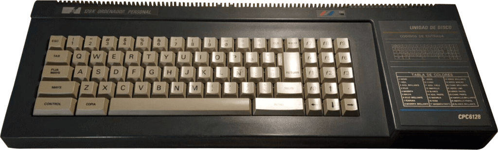 Amstrad CPC 6128, computadora doméstica de 8 bits con disquetera incorporada y monitor color.